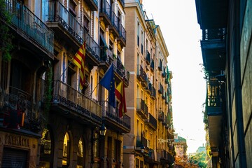 Fototapeta premium European Street Scene With Flags And Balconies