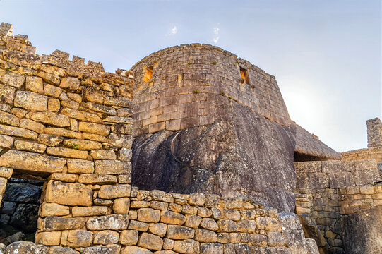 A view of the Temple of the Sun built atop a large natural rock outcrop at Machu Picchu in Peru in the dry season