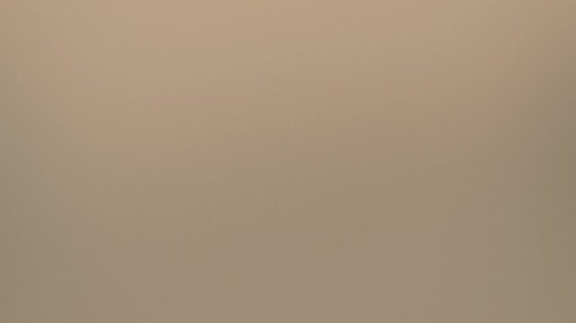 Neutral beige smooth color changing gradient abstract minimalist background animation, empty concept