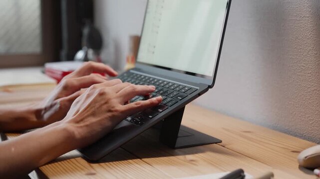 Hands Typing on Tablet Keyboard at Desk Slow Motion 4K