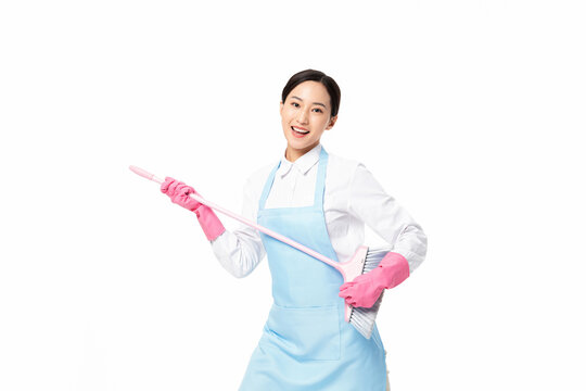 Smiling Maid Holding Cleaning Tools