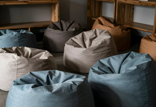 Collaborative workspace and creative office environment, group of bean bag chairs for casual meetings and flexible seating in a modern lounge area