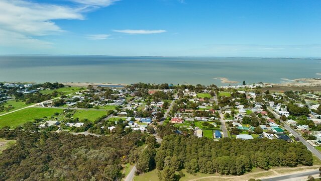 Milang, South Australia &ndash; 4K aerial drone view of rural township, residential houses, country roads beside Lake Alexandrina in spring