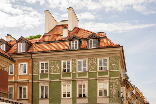 Warsaw, Poland, 20 June 2019: Historical buildings of the Old or New Town in Warsaw (Poland), made in a traditional style with decorative painting of facades using sgraffito technique