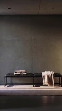 Vertical video: Shifting sunlight through window moving across wall in lounge, showing black bench