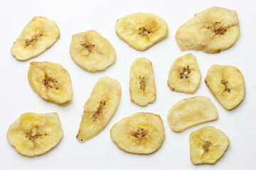 Dried Banana Chips assorted on white background © Thomas Montini