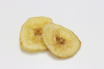 Dried Banana Chips assorted on white background © Thomas Montini