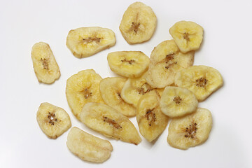 Dried Banana Chips assorted on white background © Thomas Montini