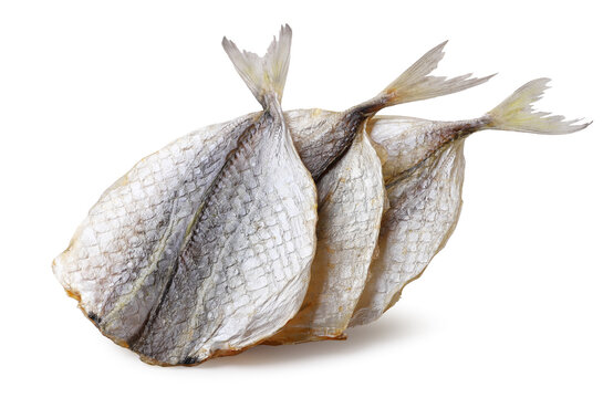 Dried salted fish close up on a white. Isolated
