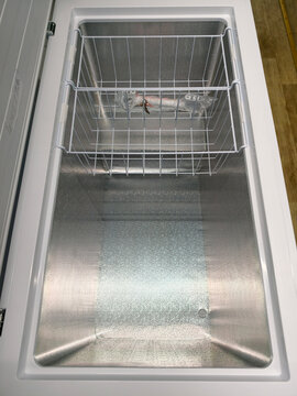 Horizontal freezer, perfect for organizing frozen treats and meals, showcased in a home appliance superstore