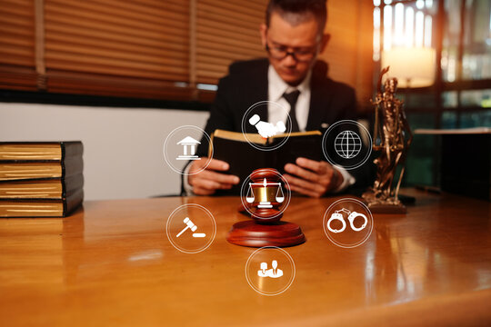 Asian Lawyer or Judge Holding Gavel with Digital Legal Technology Network Icons