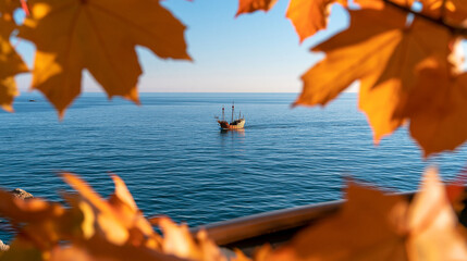 Elegant autumn holiday background with a sailing ship crossing deep blue water while golden leaves frame the foreground, Columbus Day, seasonal celebration, exploration, travel, © Nataliya
