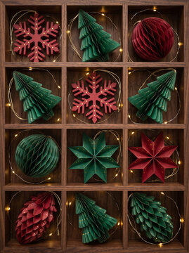 Red and green handmade paper Christmas ornaments in Wooden Display Box. Elegant and festive holiday decorations with warm led lights.