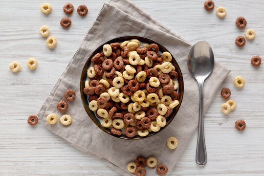 Healthy Breakfast Cereal with Whole Milk in a Bowl, top view.