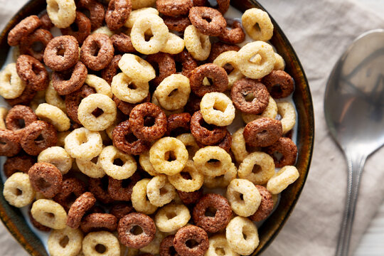 Healthy Breakfast Cereal with Whole Milk in a Bowl, top view.