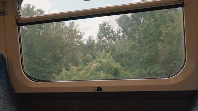Interior of a British suburban electric train, likely a Class 465 or similar Networker train operated in the London and South East region, United Kingdom - August 22, 2026.