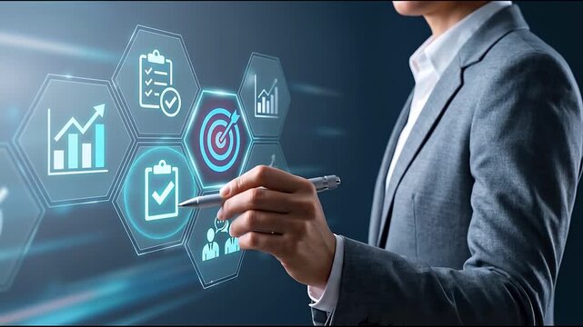 Businessman hand pointing pen at target goal hexagon icon with growth chart and checklist hologram, representing business strategy planning, performance tracking and management technology concept