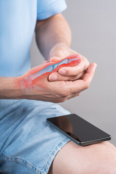 Closed fracture and inflammation of middle phalanx of thumb bone, with illustration of anatomical model of human skeleton