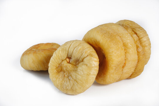 Dried figs on white background