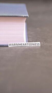 Warmheartedness Word Card on Book, Empathy and Human Values Clip