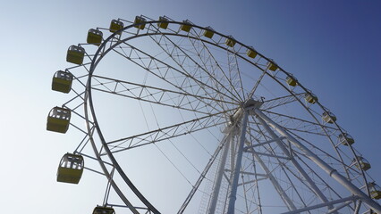 ferris wheel on a blue sky © Dika
