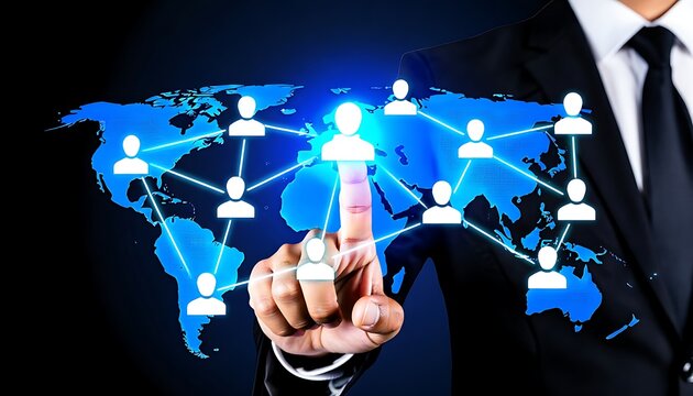 A businessman touches a glowing network of person icons superimposed on a world map illustrating global connectivity globalization person icon digital network world map communication