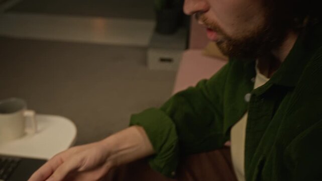 Caucasian young man watching bank balance drain to zero on smartphone while feeling stressed. Useful for cyber fraud, debt crisis and fintech cybersecurity campaigns