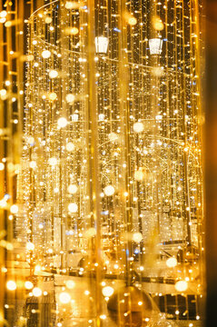 Golden glowing illumination creates a magical winter bokeh