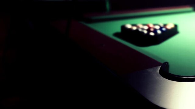 A vibrant scene captures a pool table set for a game. Balls are neatly arranged in a triangle. Soft light creates a warm atmosphere in the cozy game room, inviting friendly competition.