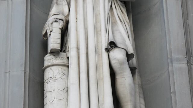 Statue of Niccolo Machiavelli at Uffizi Gallery in Florence - Close-up Marble Sculpture of Italian Philosopher, Italy