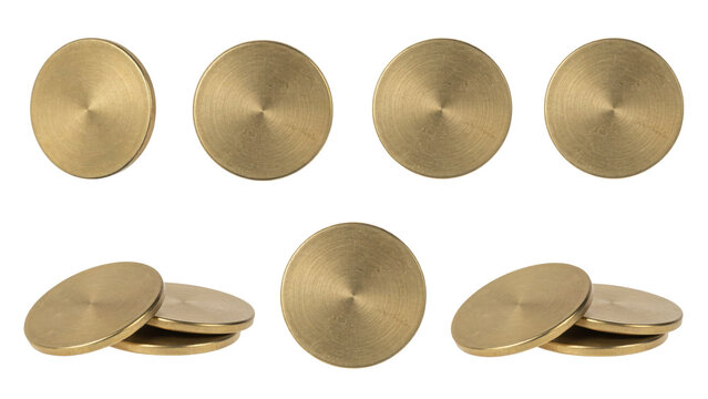 Collection of seven brushed brass circular discs arranged in rows isolated on a transparent background