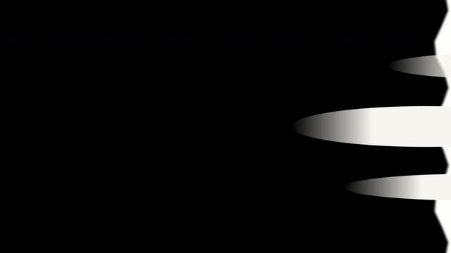 Dynamic abstract motion graphic transition with yellow and white geometric shapes on black background.