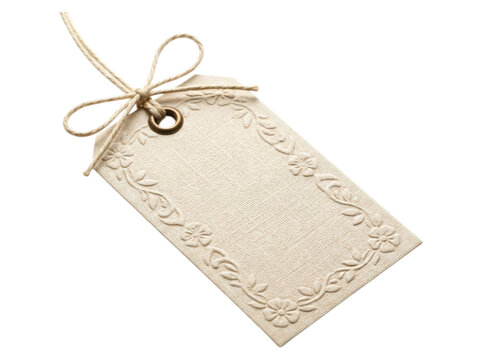 Vintage cream colored paper tag with floral embossed border and jute string isolated on transparent background