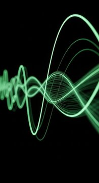 Abstract green glowing sinusoidal curves and wavy light trails on black background depicting digital data flow, fiber optic communication, electronic signals, or sound frequency waves.