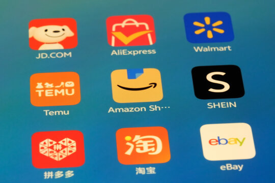 Shanghai,China-Sep.6th 2026: screen displaying icons for popular e-commerce and shopping apps, including JD.COM, AliExpress, Walmart, Temu, Amazon Shopping, SHEIN, Pinduoduo, Taobao, and eBay