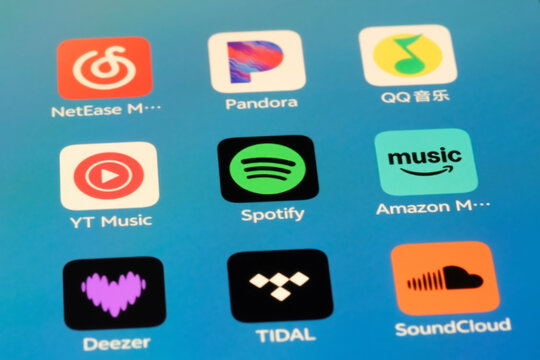 Shanghai,China-Sep.6th 2026: music streaming app icons including NetEase Music, Pandora, QQ Music, YT Music, Spotify, Amazon Music, Deezer, TIDAL, and SoundCloud displayed on a smartphone screen.