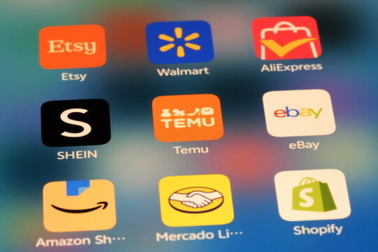 Shanghai,China-Sep.6th 2026: E-commerce and online shopping app icons on a phone screen, featuring Etsy, Walmart, AliExpress, SHEIN, Temu, eBay, Amazon Shopping, Mercado Libre, and Shopify.