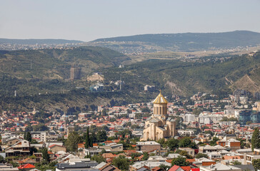 Aerial panoramic cityscape of Tbilisi, Georgia. Tbilisi is the capital and the largest city of Georgia.  © Rechitan Sorin