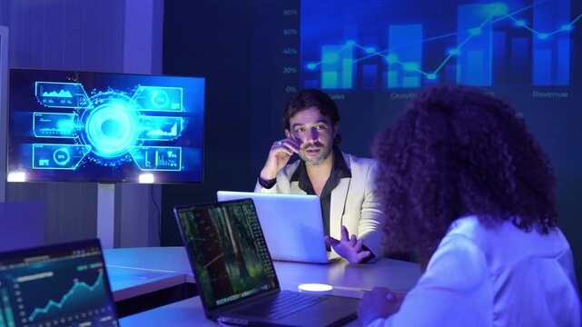 Business professionals collaborating in a modern office, analyzing digital dashboards and financial data, discussing market trends, business performance, data visualization, strategic planning.