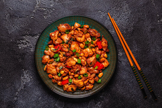 Kung Pao chicken, stir-fried chicken with peanuts.