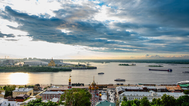 A sunset view of Nizhny Novgorod, including the confluence of the Oka and Volga rivers.