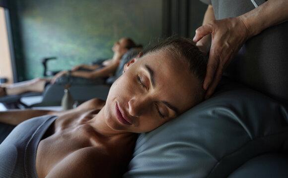 Young women in spa for relaxation and wellness treatment.
