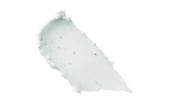 Blue exfoliating cosmetic cream smear with microbeads isolated on transparent background, skincare cleansing scrub or toothpaste texture sample for beauty product design.