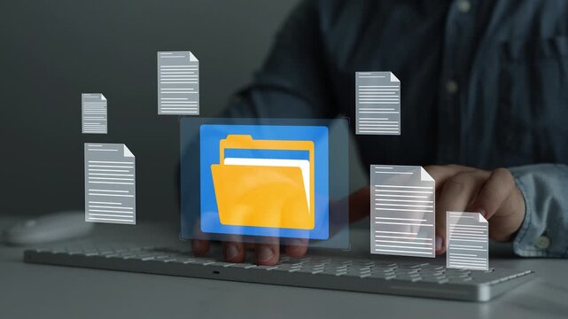Document management system with file folders and archive storage. Digital organization helps manage records, data and business information.
