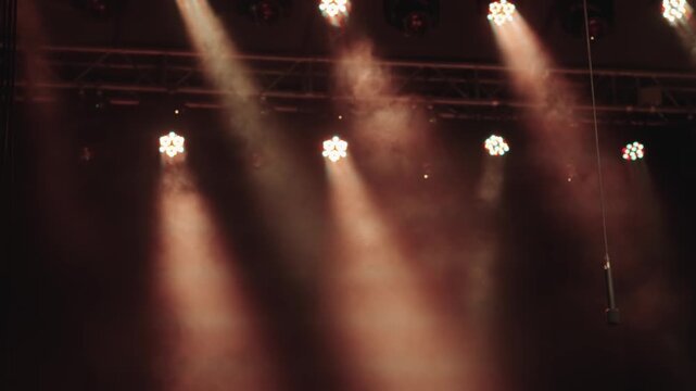 A stage with lights shining on it