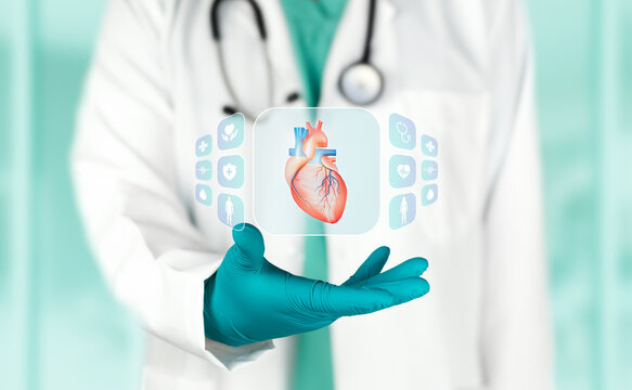Surgeon examining the heart to diagnose coronary artery disease and heart failure. Concept of heart attack prevention, medical research, and technology with a bokeh background.