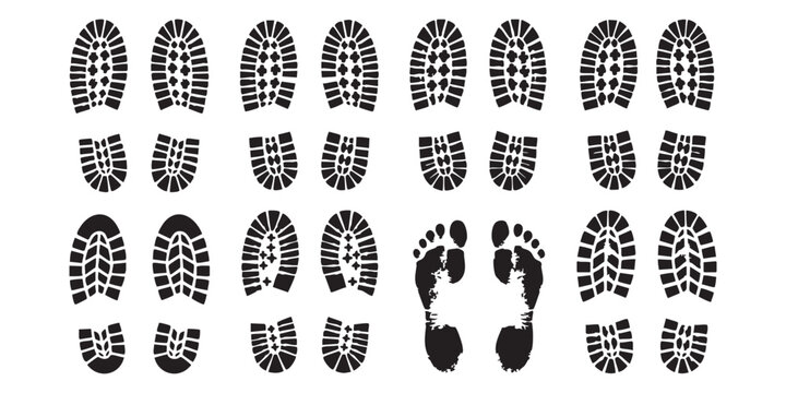 Set of black shoe sole prints and human footprints isolated on a simple background