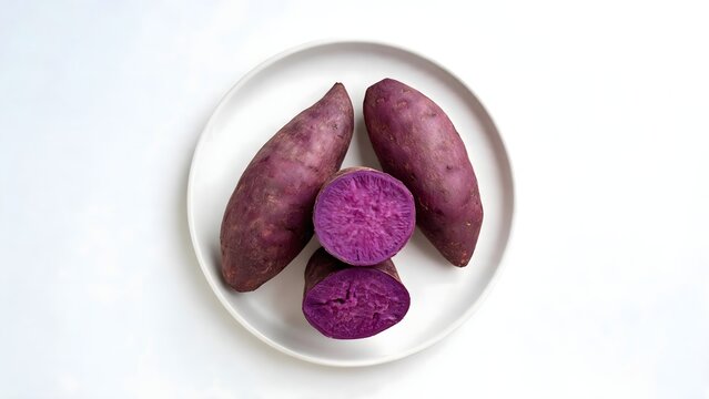 Purple sweet potatoes on white plate