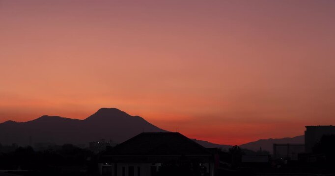 Timelapse of colorful sky gradient at dawn before sunrise