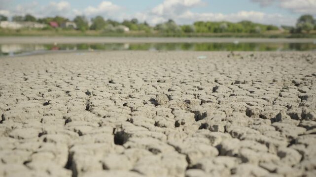 Dolly shot. Lake Bed Dries Up and Cracks During an Extreme Drought